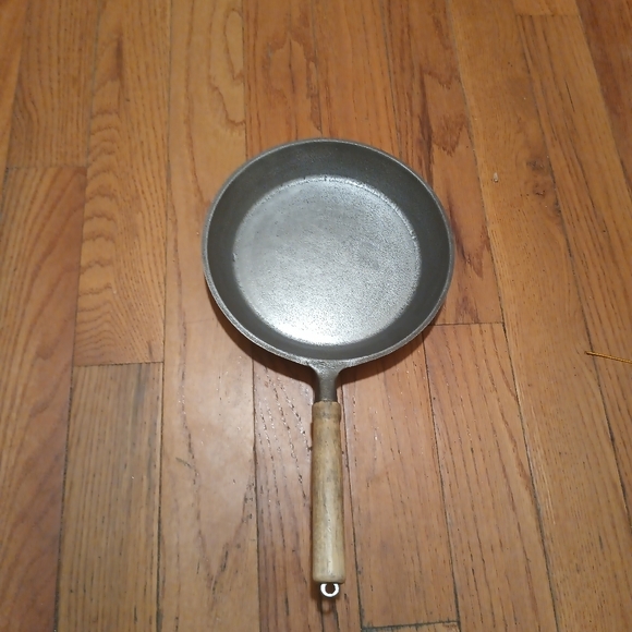 Classic Gray Cast Iron Frying Pan with Wooden Handle